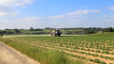 Application of agricultural inputs on farmland in Belgium.